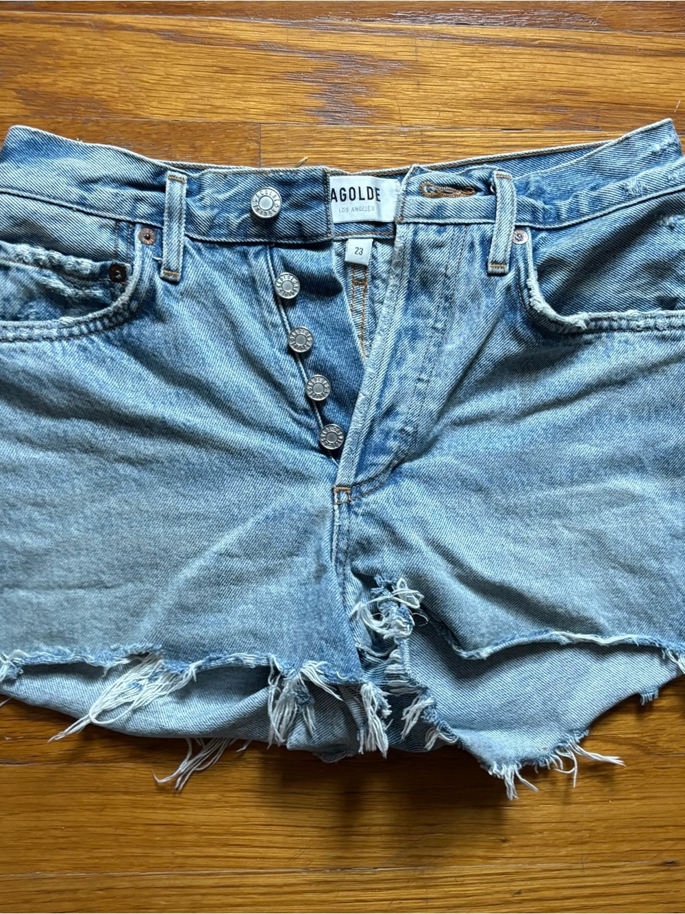 Agolde Light Wash Distressed Denim Cutoff Shorts